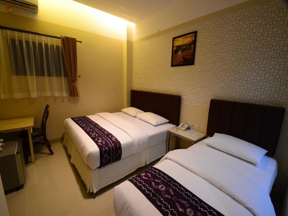 Queen City Hotel Banjarmasin Banjarmasin  Exteriör bild